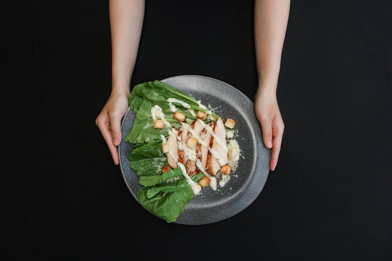Fresh Caesar salad to pair with mod pizza
