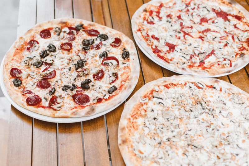 Calexico mods pizza with chorizo and cilantro