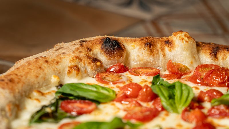 No sauce base mod pizza crust with fresh toppings